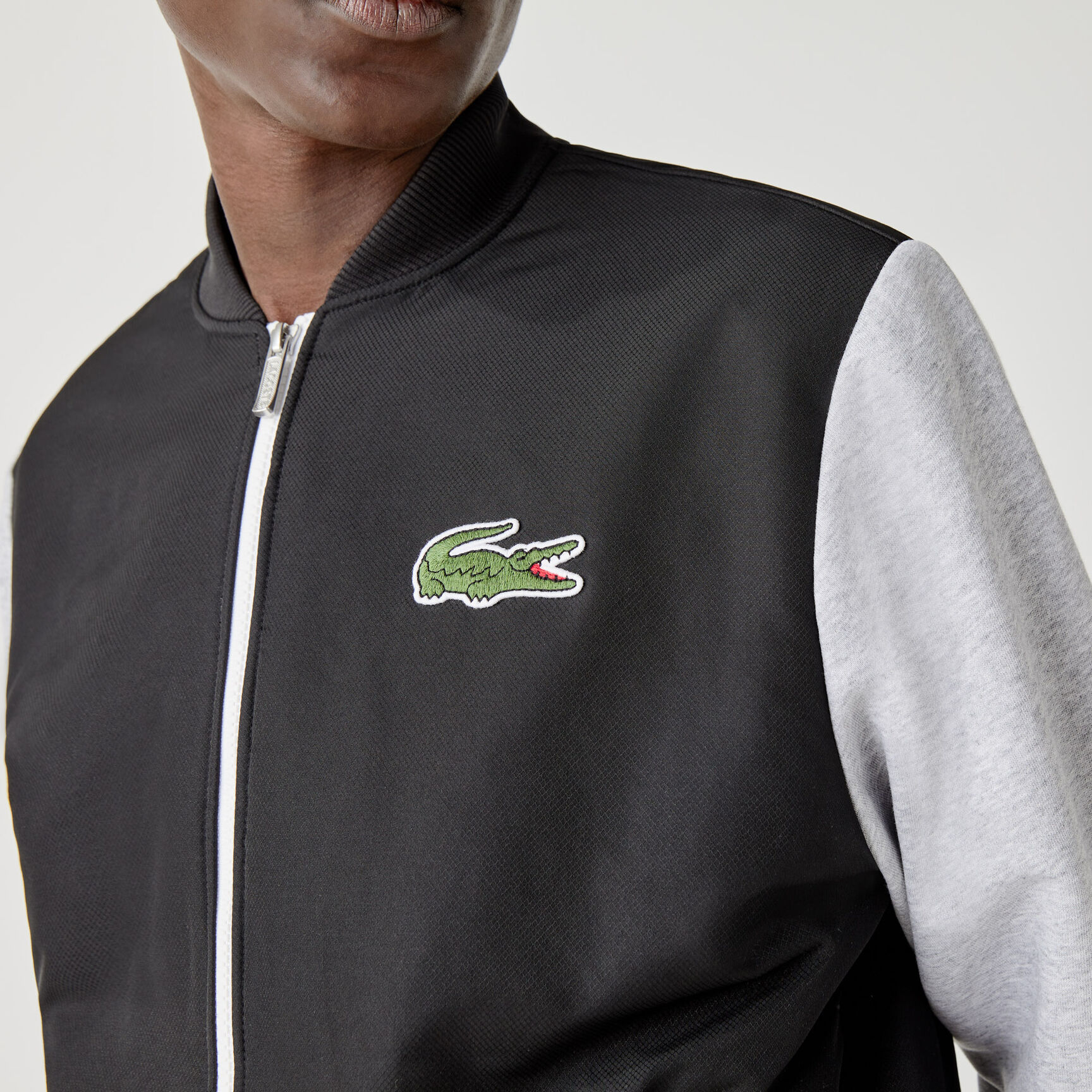 جاكيت تيدي بسحاب من الصوف مع طبعة ثنائية اللون للرجال من مجموعة Lacoste SPORT جاكيت تيدي بسحاب من الصوف مع طبعة ثنائية اللون للرجال من مجموعة Lacoste SPORT