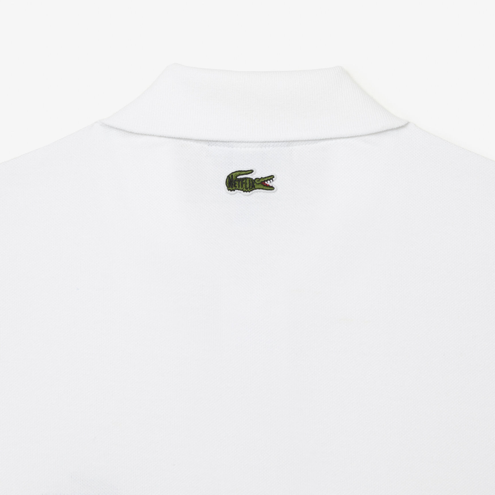 تيشيرت بولو قطن عضوي للرجال مجموعة Lacoste x Netflix تيشيرت بولو قطن عضوي للرجال مجموعة Lacoste x Netflix