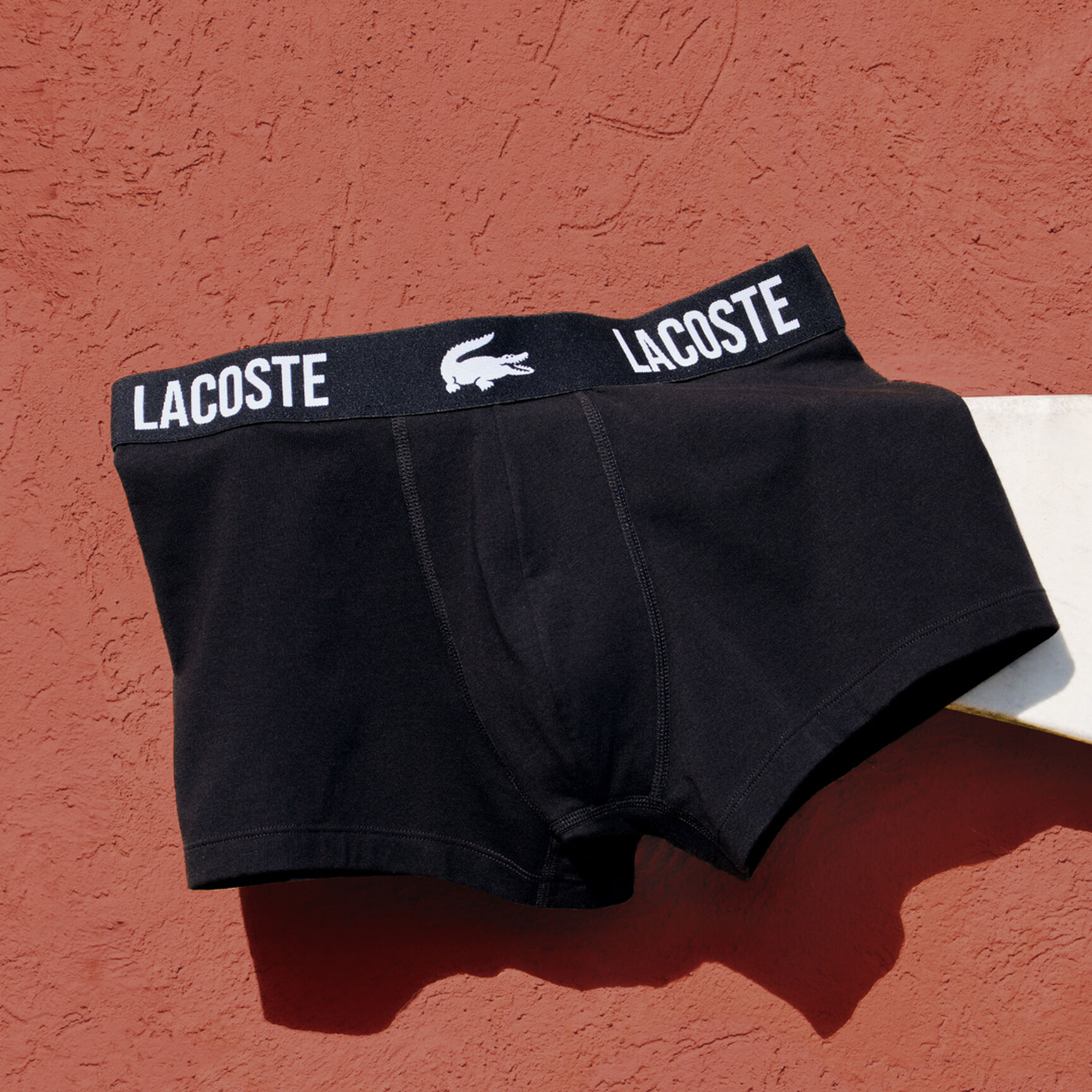 طقم بوكسر لاكوست جيرسيه بشعار الماركة للرجال، 3 قطع Men's Lacoste Branded Jersey Trunk Three-Pack - 5H3321-00-TR2