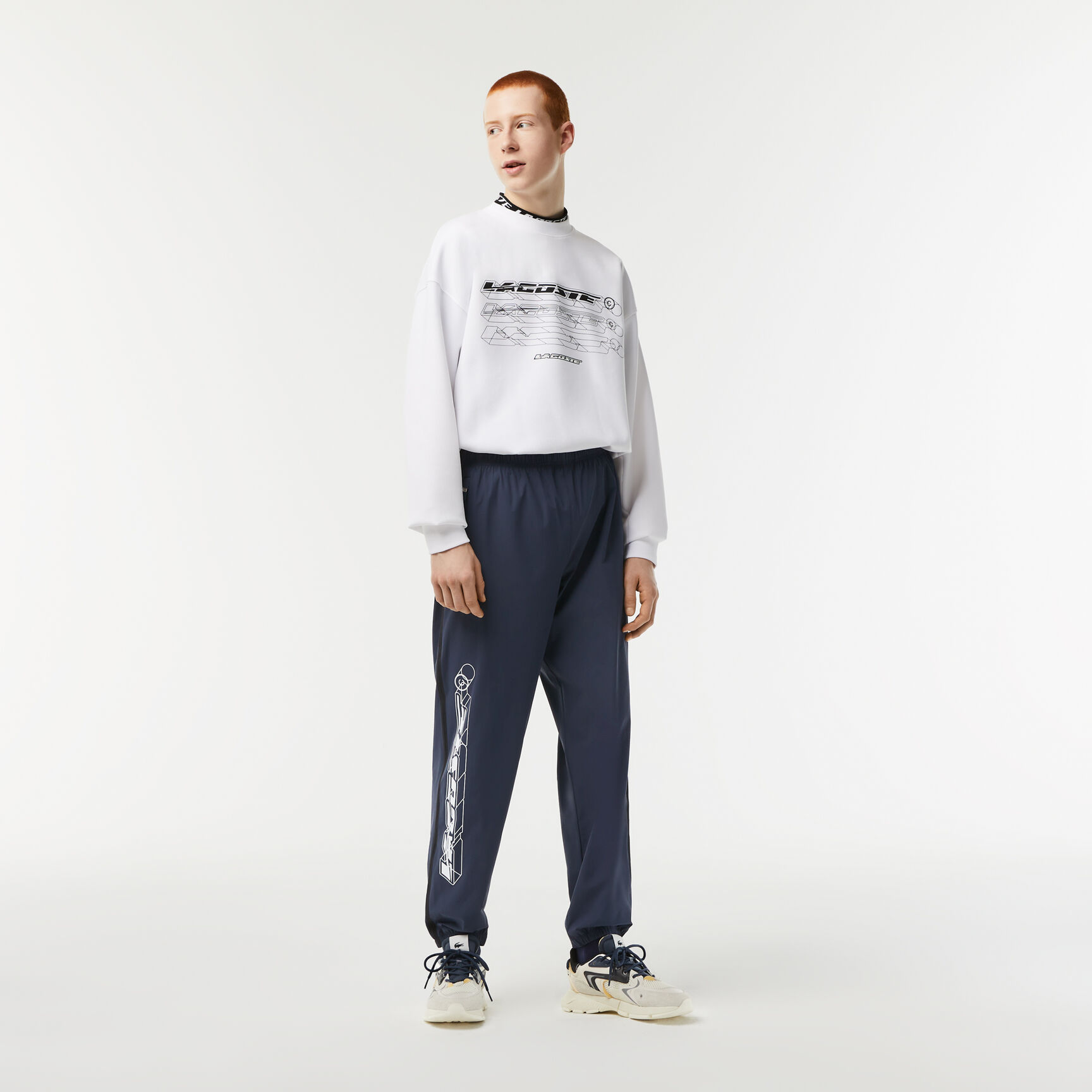 بنطال رياضي لاكوست بنسيج مطاطي مقاوم لزخات الماء للرجال بنطال رياضي لاكوست بنسيج مطاطي مقاوم لزخات الماء للرجال