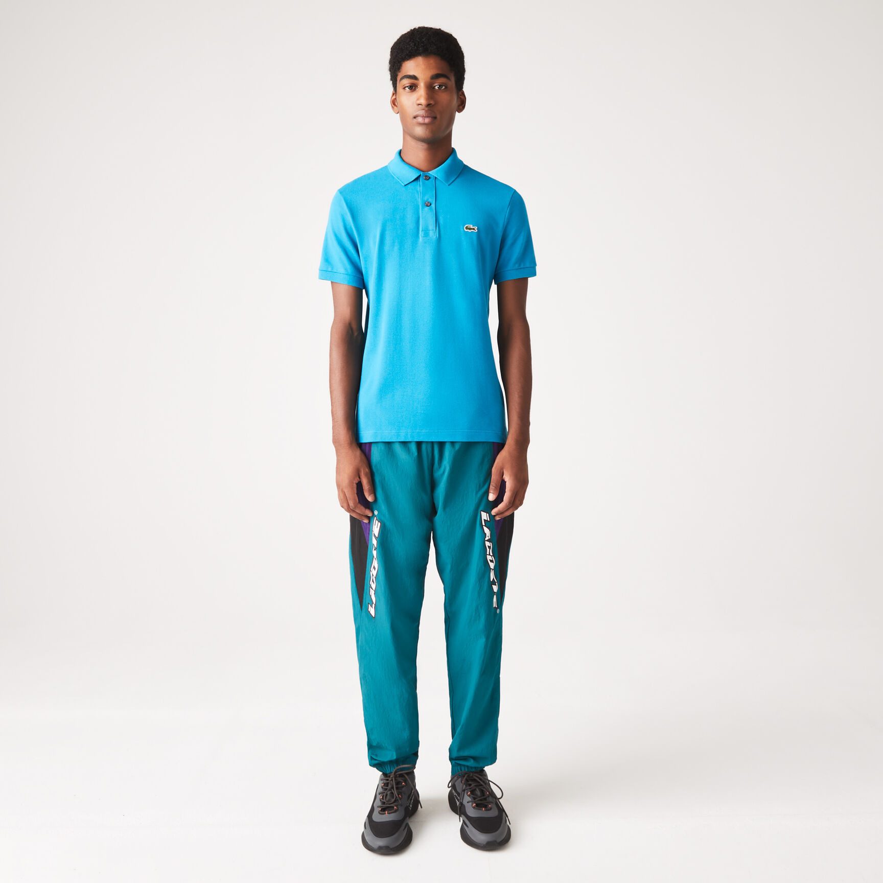 قميص بولو بيكيه بقصة ضيقة L.12.12 قميص بولو بيكيه بقصة ضيقة L.12.12