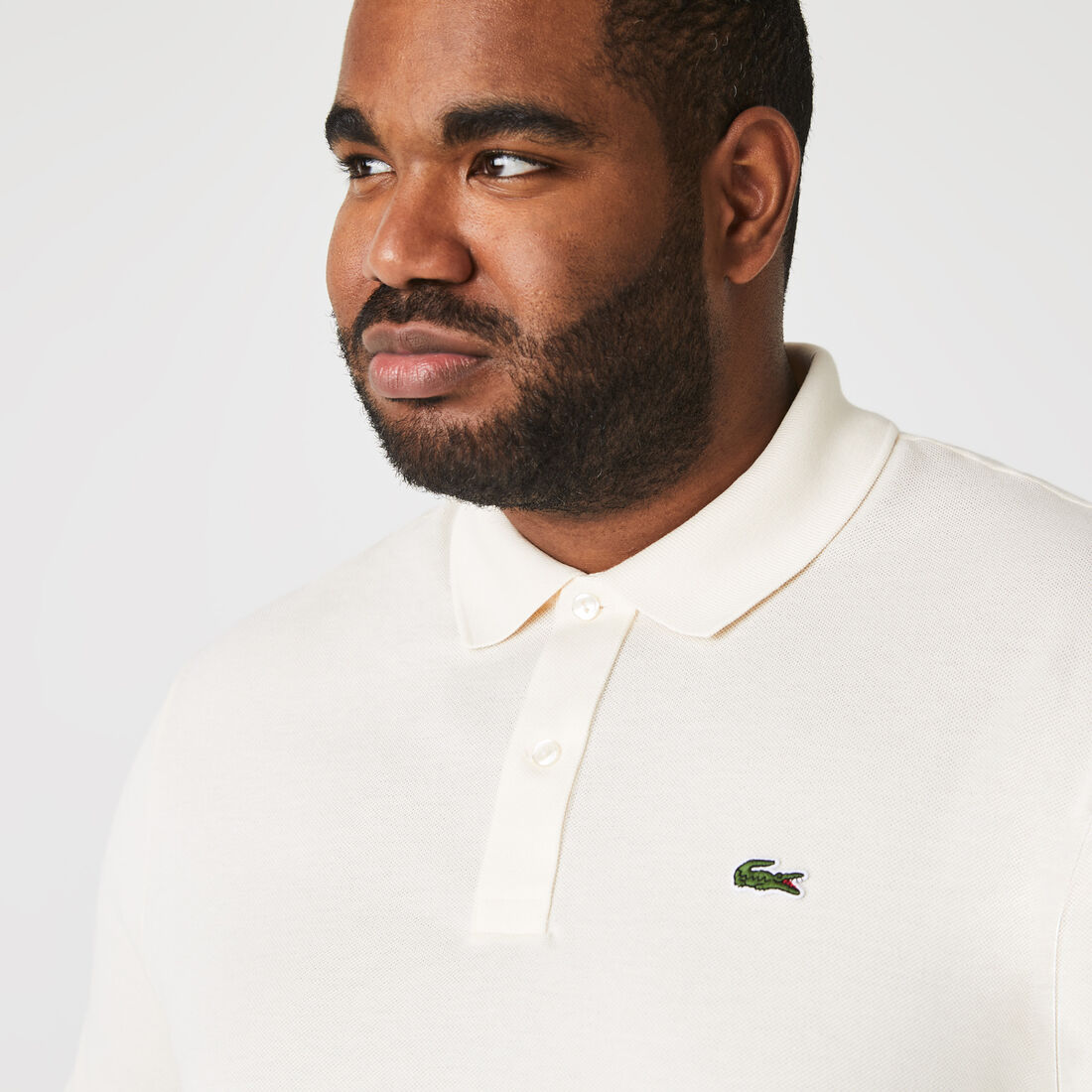 قميص بولو بيكيه بقصة ضيقة L.12.12 قميص بولو بيكيه بقصة ضيقة L.12.12