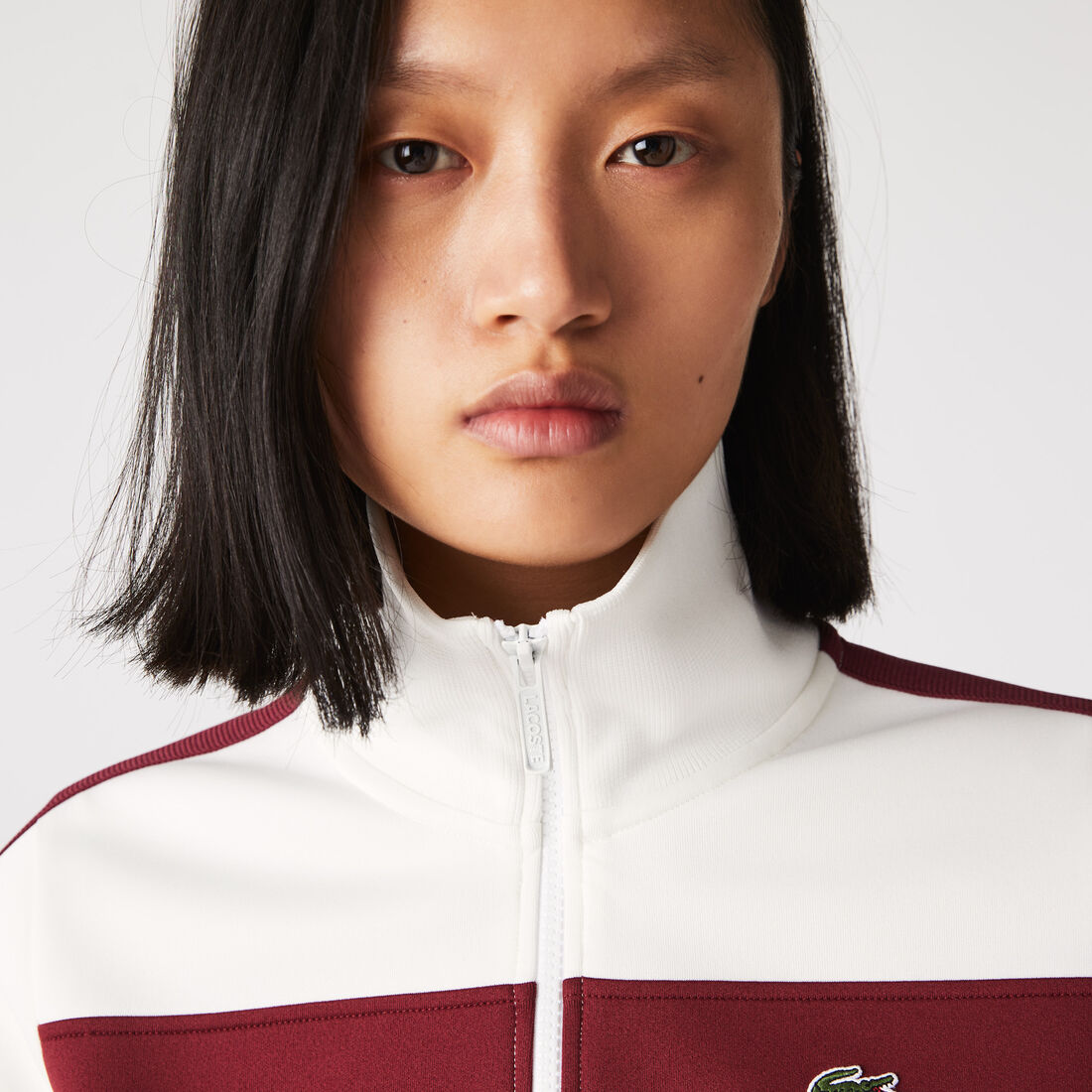 جاكيت رياضي كلاسيكي مقسم بألوان بياقة عالية وسحّاب للنساء جاكيت رياضي كلاسيكي مقسم بألوان بياقة عالية وسحّاب للنساء