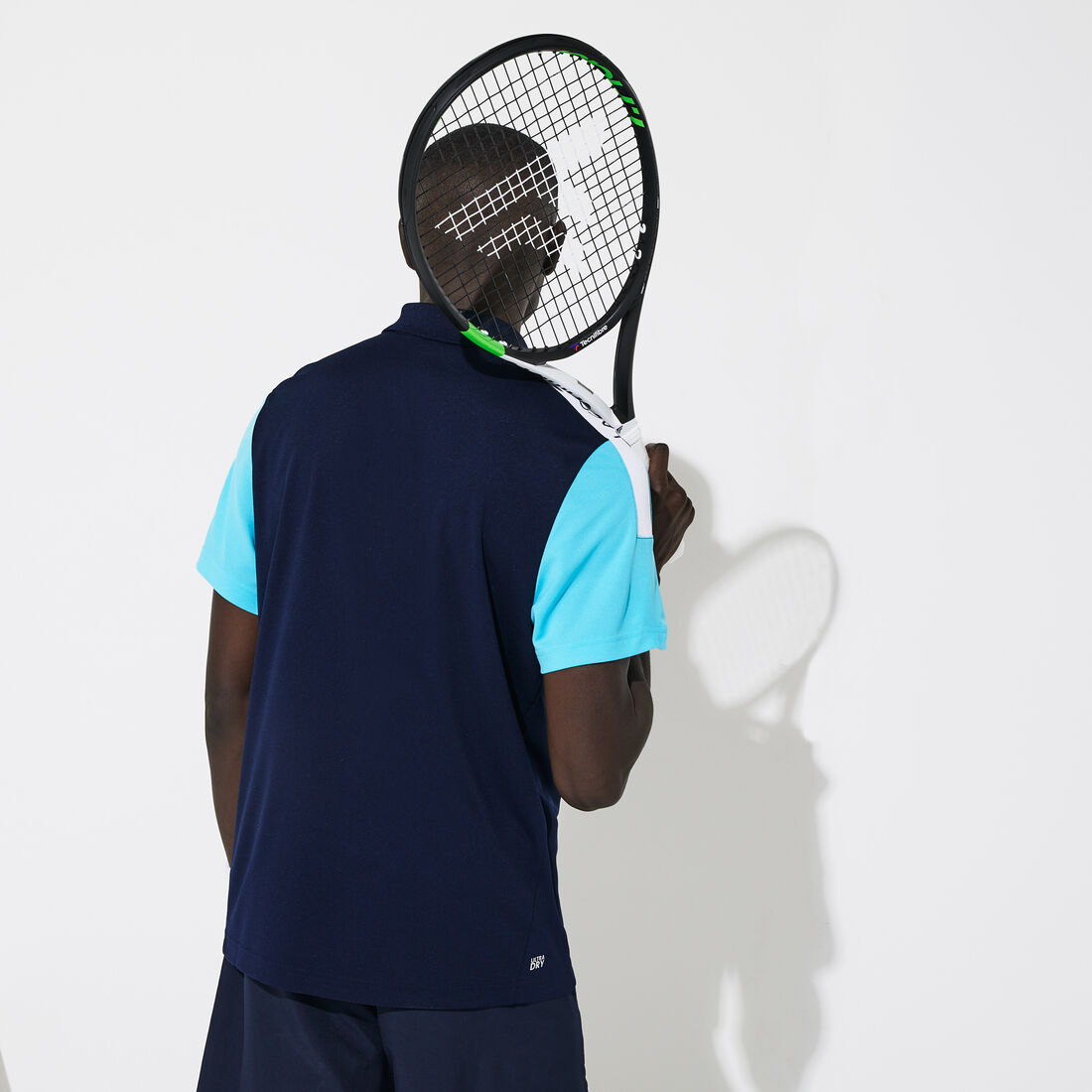 قميص بولو من مجموعةLacoste SPORT محيك من البيكيه ويسمح بمرور الهواء للرجال قميص بولو من مجموعةLacoste SPORT محيك من البيكيه ويسمح بمرور الهواء للرجال