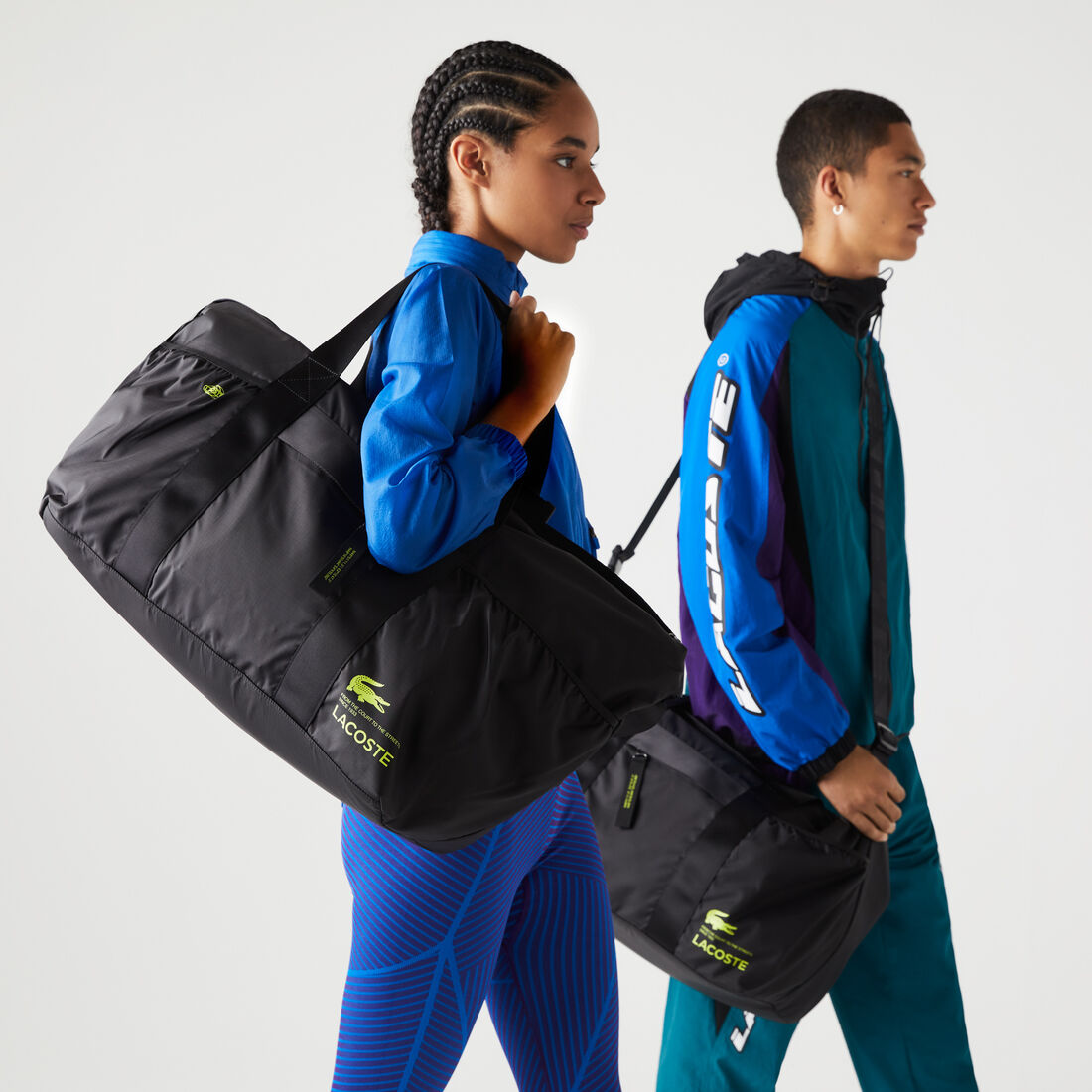 حقيبة لعطلات نهاية الأسبوع بشعار لاكوست بلون مغاير للجنسين