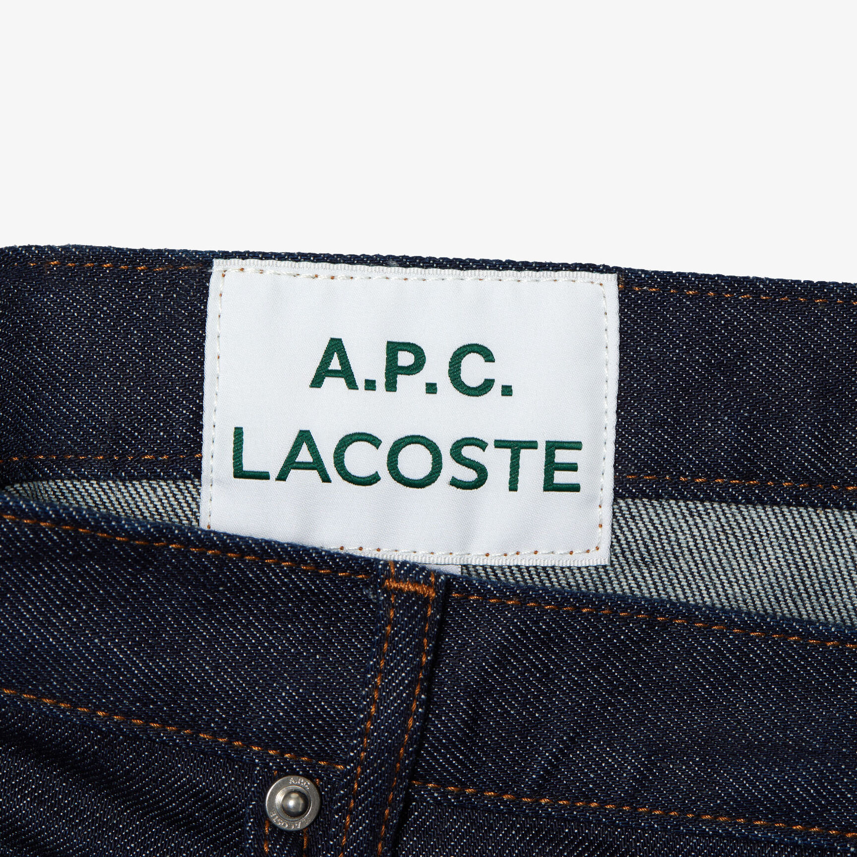 بنطال جينز بخصر منخفض للجنسين مجموعة Lacoste x A.P.C. بنطال جينز بخصر منخفض للجنسين مجموعة Lacoste x A.P.C.