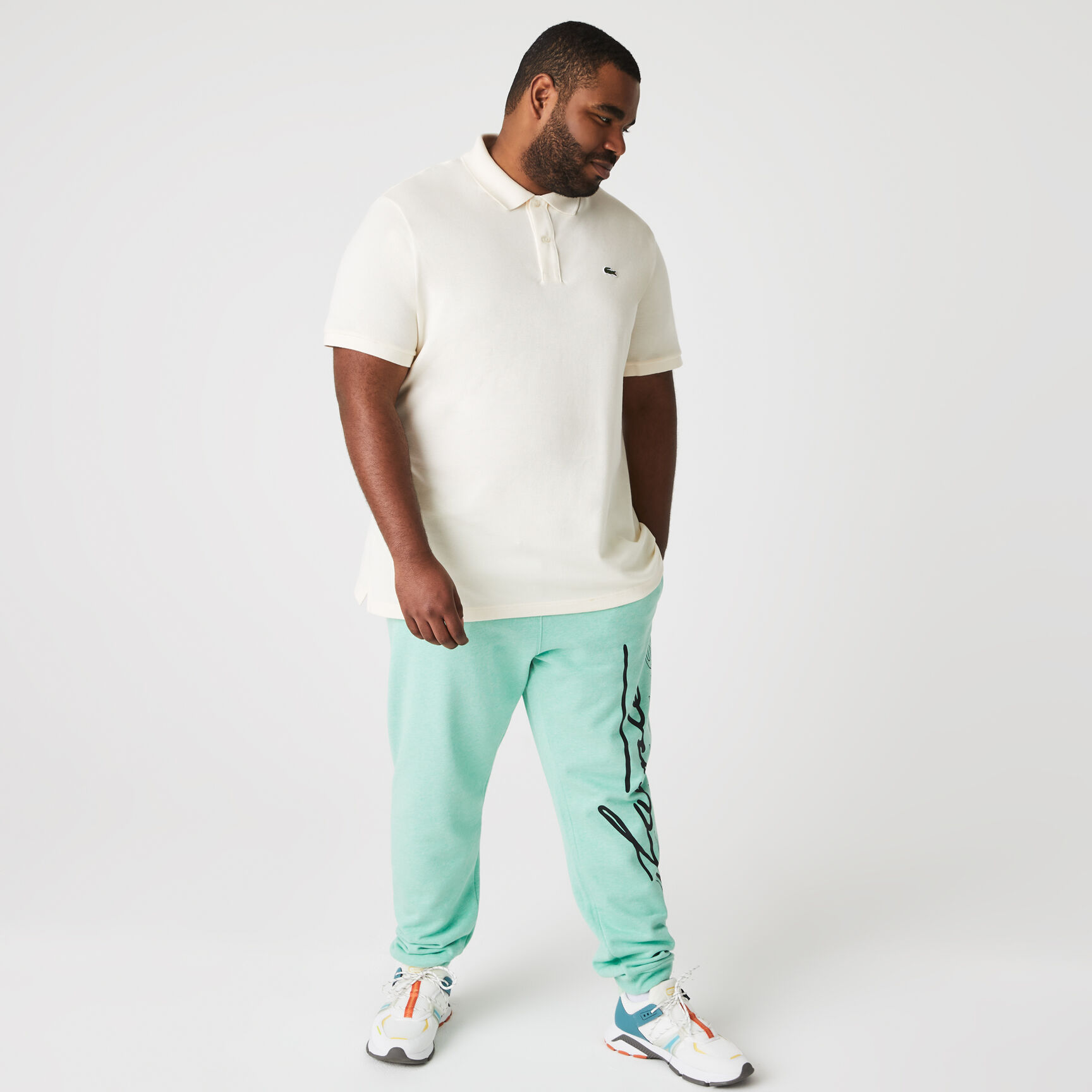 قميص بولو بيكيه بقصة ضيقة L.12.12 قميص بولو بيكيه بقصة ضيقة L.12.12