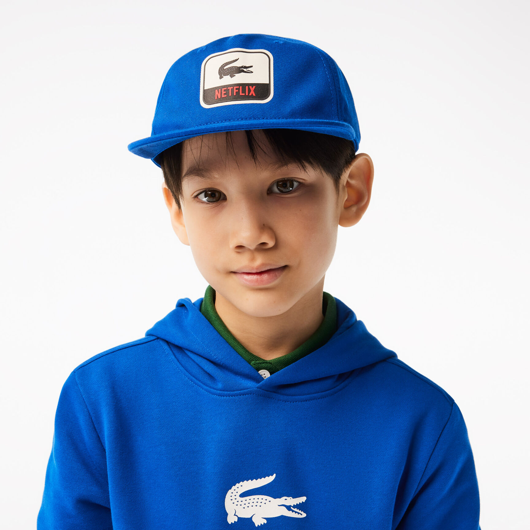 كاب قطن عضوي للأطفال مجموعة Lacoste x Netflix كاب قطن عضوي للأطفال مجموعة Lacoste x Netflix