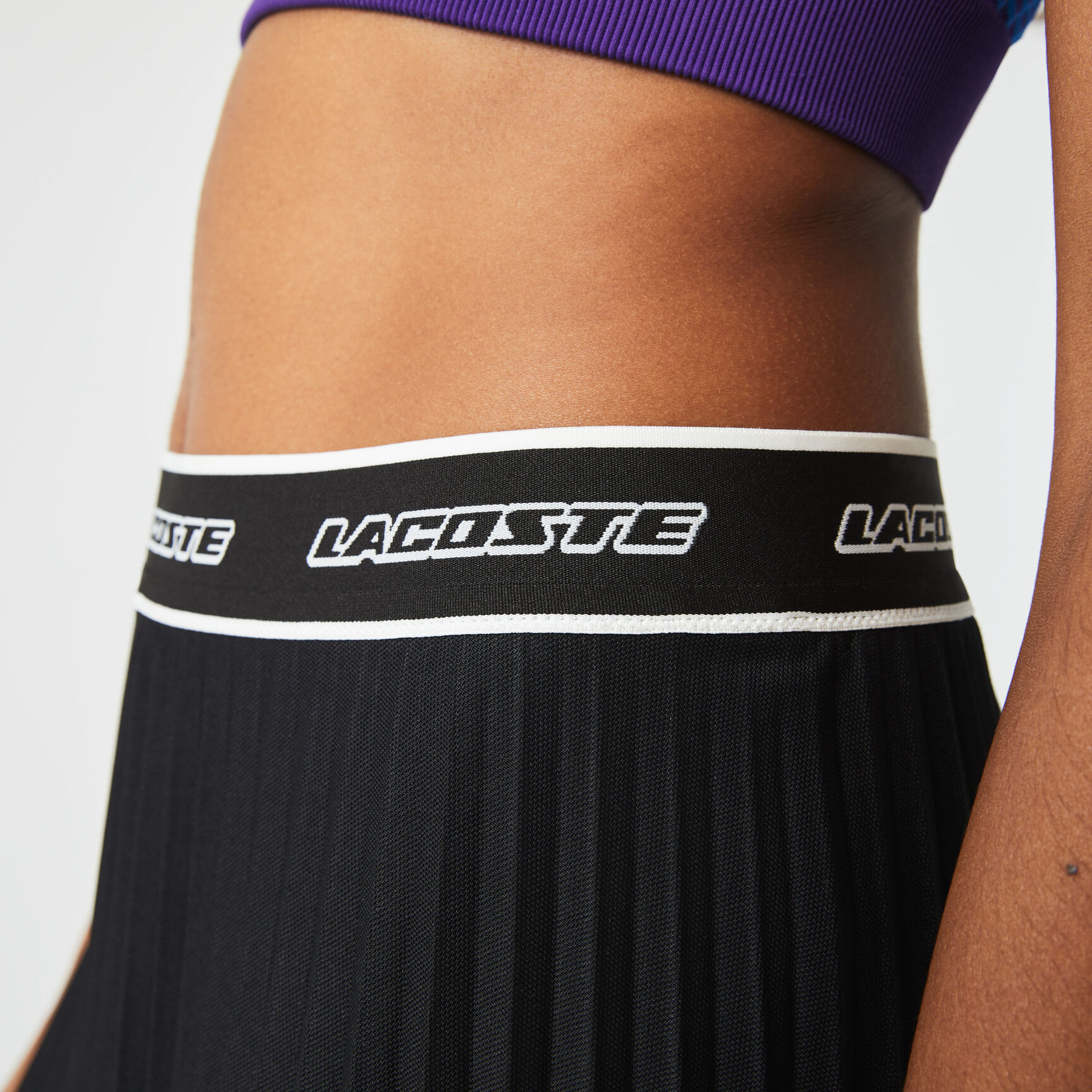 تنورة لاكوست قصيرة بطيات وخصر مطاطي للنساء تنورة لاكوست قصيرة بطيات وخصر مطاطي للنساء