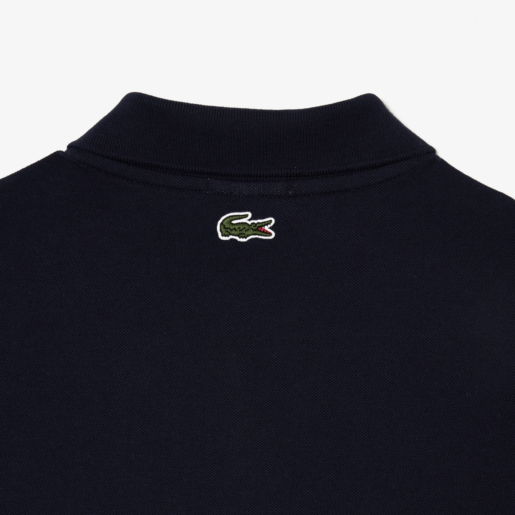 تي شيرت بولو بيكيه فائق الخفة بطبعة الكرة الأرضية من مجموعة لاكوست موفمنت Lacoste Signature Print Stretch Pique Polo Shirt - PH1136-00-166