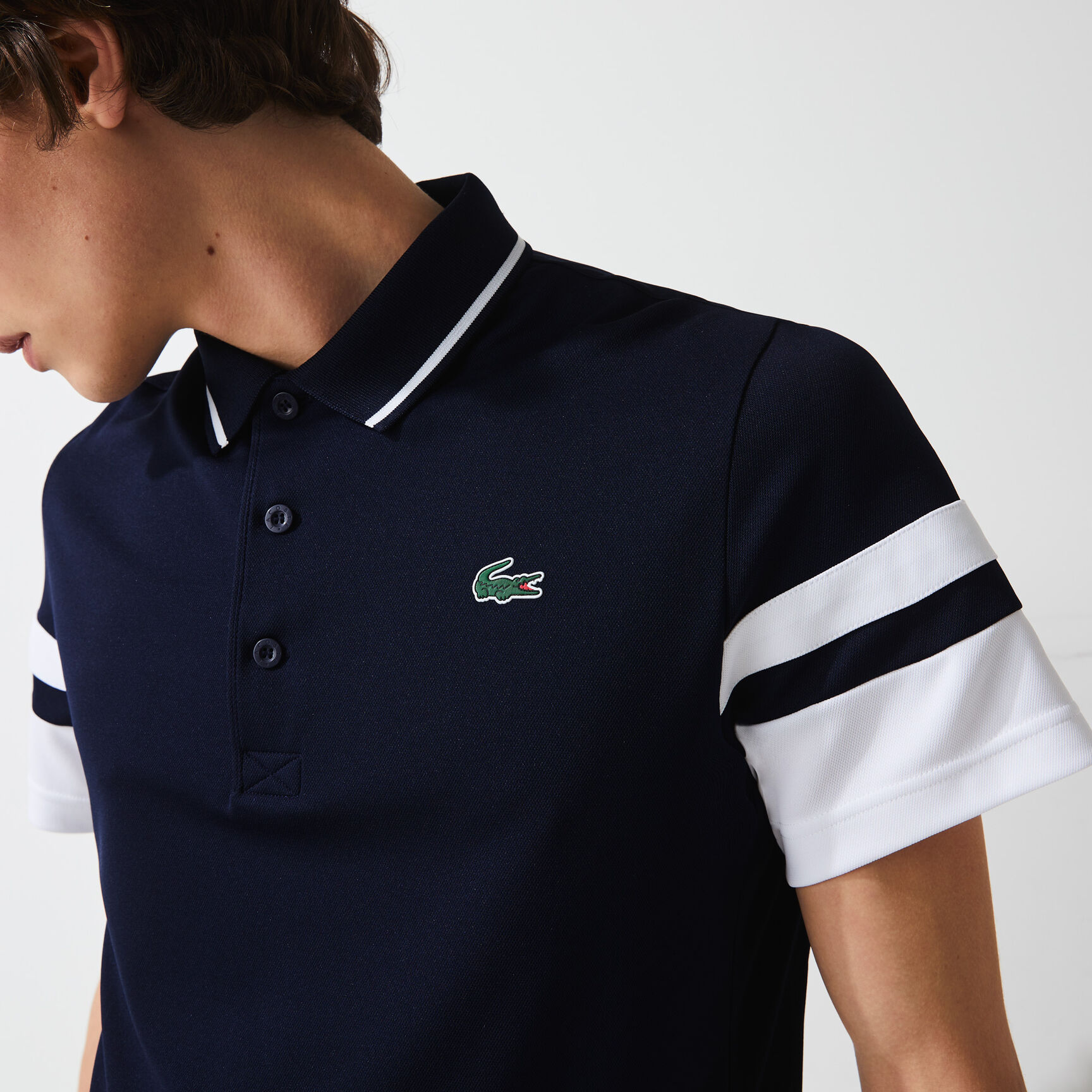 قميص بولو للتنس من البيكيه المسامي للرجال مع أكمام مقلمة مجموعة Lacoste SPORT قميص بولو للتنس من البيكيه المسامي للرجال مع أكمام مقلمة مجموعة Lacoste SPORT