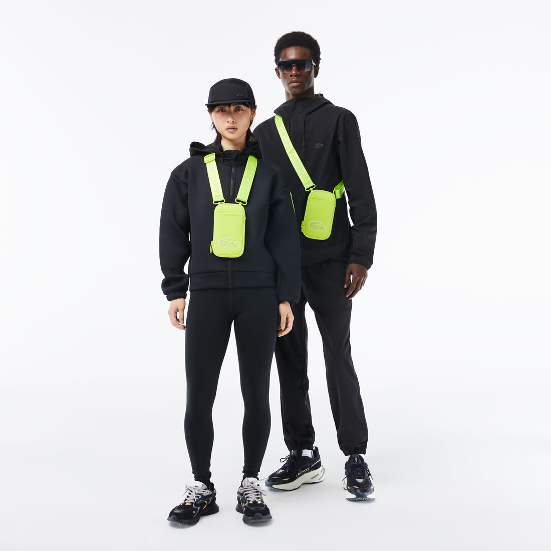 حافظة هاتف لاكوست بحمالة وشعار الماركة للجنسين