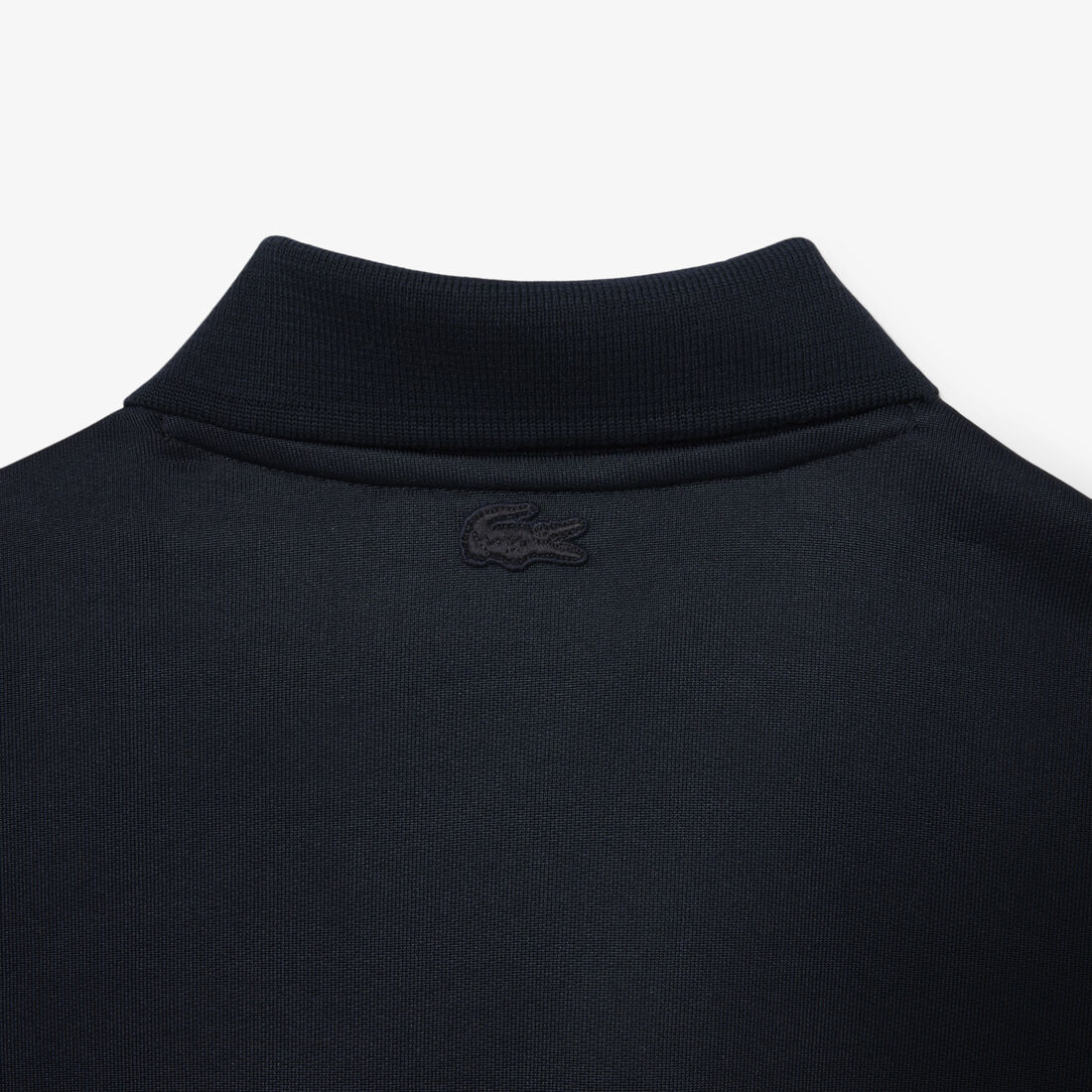 قميص بولو من الصوف بقصة فضفاضة مزين بشعار مميز Loose Fit Badge Accent Fleece Polo Shirt - DH1208-00-350