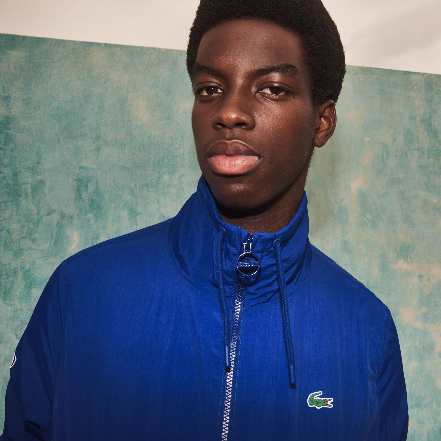 جاكيت رجالي خفيف الوزن من مجموعة Lacoste SPORT و Novak Djokovic جاكيت رجالي خفيف الوزن من مجموعة Lacoste SPORT و Novak Djokovic