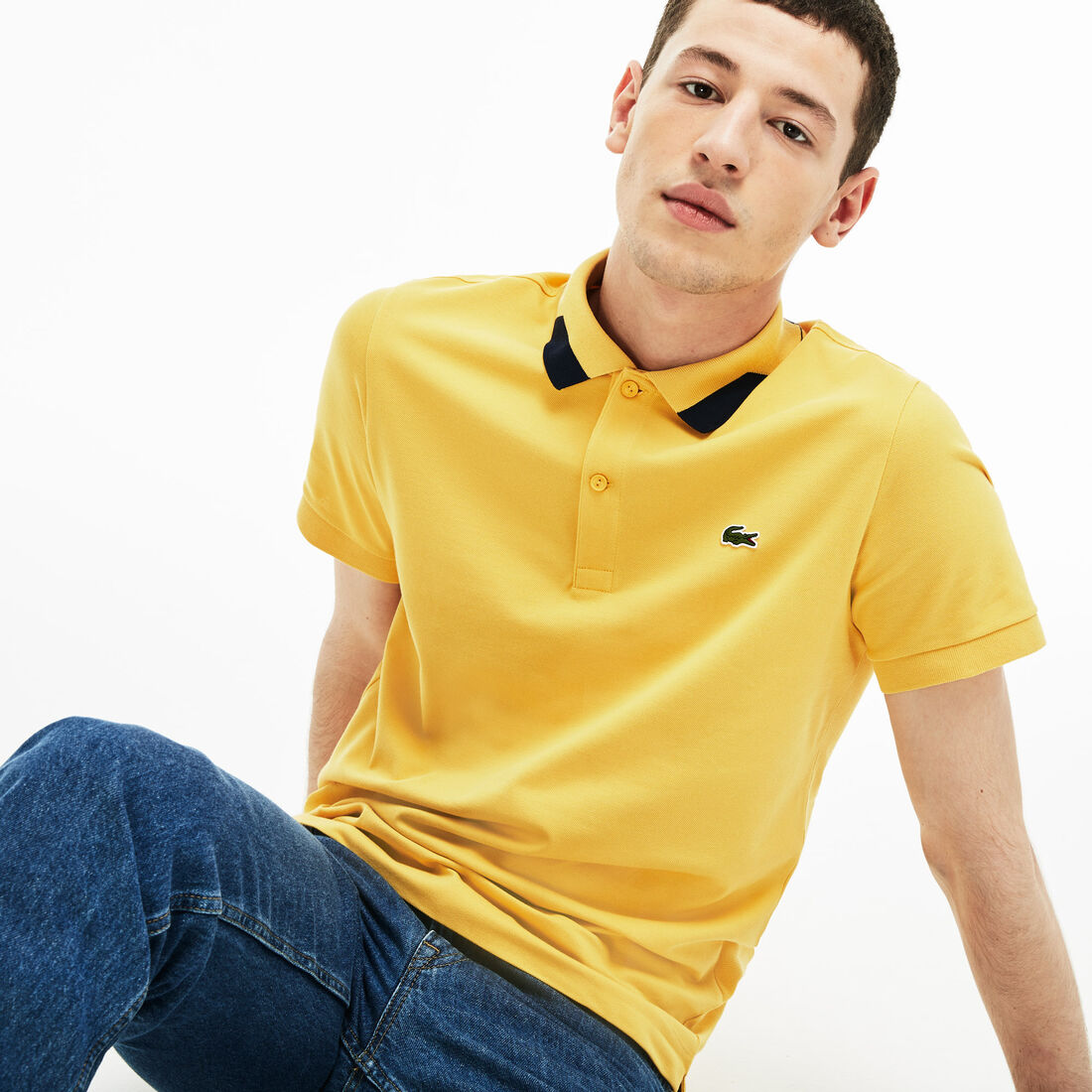 قميص بولو للرجال من بيكيه بيما المرن ذو قصة ضيقة بلمسات جمالية متباينة من Lacoste قميص بولو للرجال من بيكيه بيما المرن ذو قصة ضيقة بلمسات جمالية متباينة من Lacoste