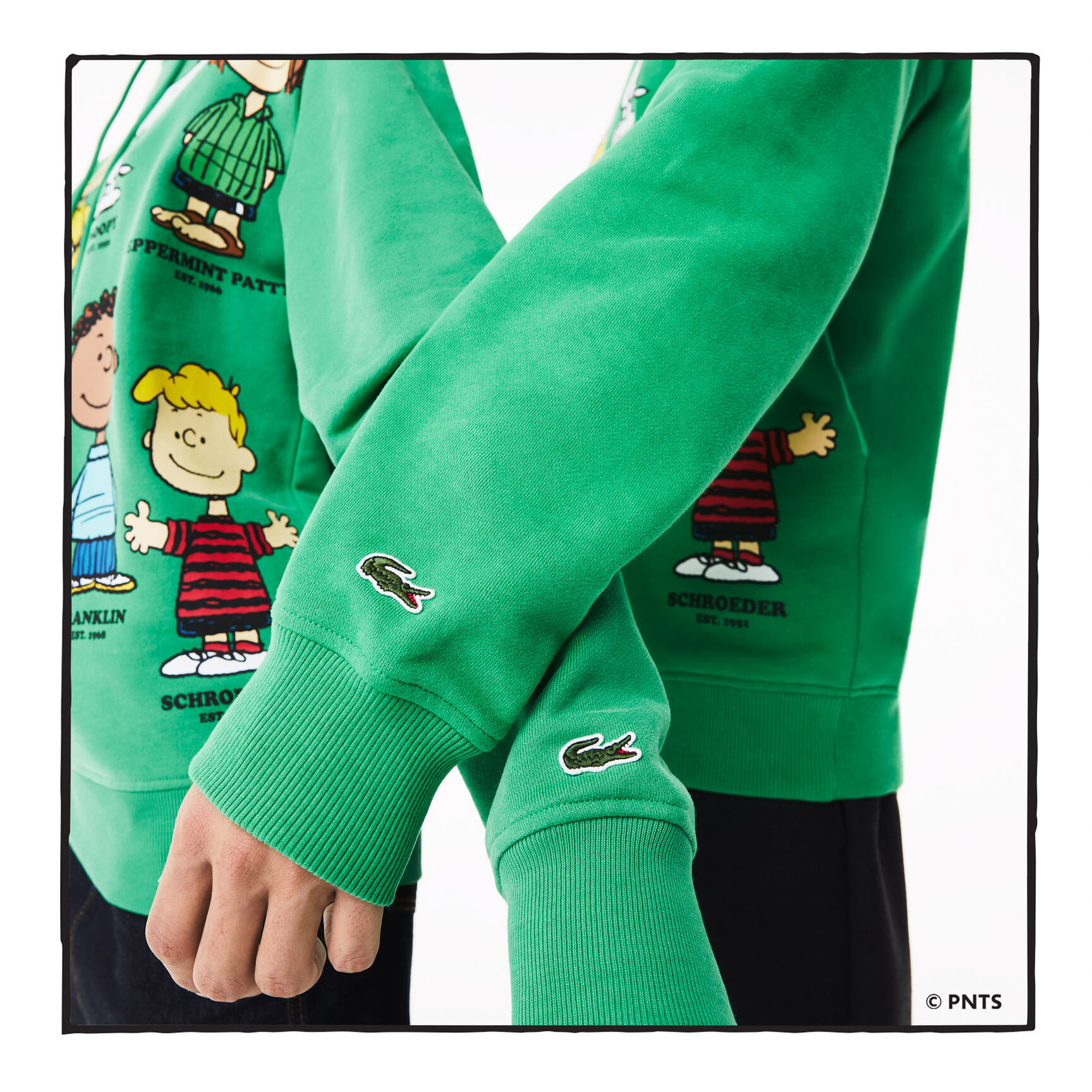 سويت شيرت من القطن العضوي بقلنسوة للجنسين من Lacoste x Peanuts سويت شيرت من القطن العضوي بقلنسوة للجنسين من Lacoste x Peanuts