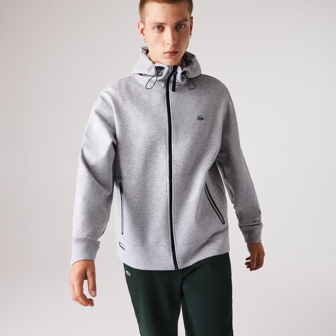 سترة بغطاء رأس وسحاب مع علامة Lacoste التجارية وشارة للرجال سترة بغطاء رأس وسحاب مع علامة Lacoste التجارية وشارة للرجال