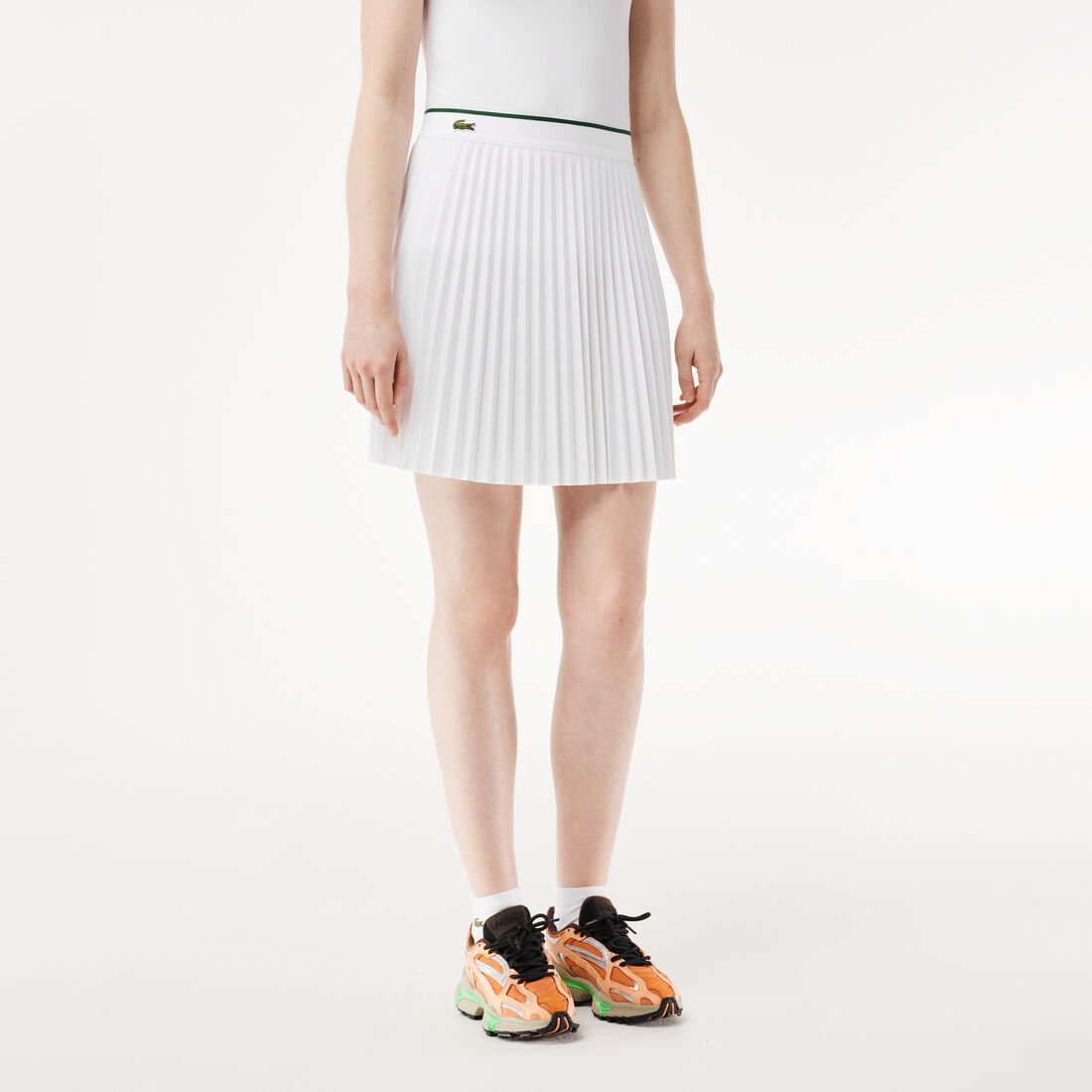 سترة بياقة بولو وألوان مغايرة صُنعت في فرنسا Short Pleated Elastic Waist Skirt - JF2701-00-001