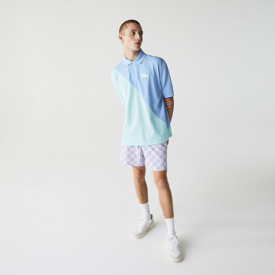 قميص بولو بيكيه القطن للجنسين بقصة فضفاضة وكتل لونية مجموعة Lacoste LIVE قميص بولو بيكيه القطن للجنسين بقصة فضفاضة وكتل لونية مجموعة Lacoste LIVE