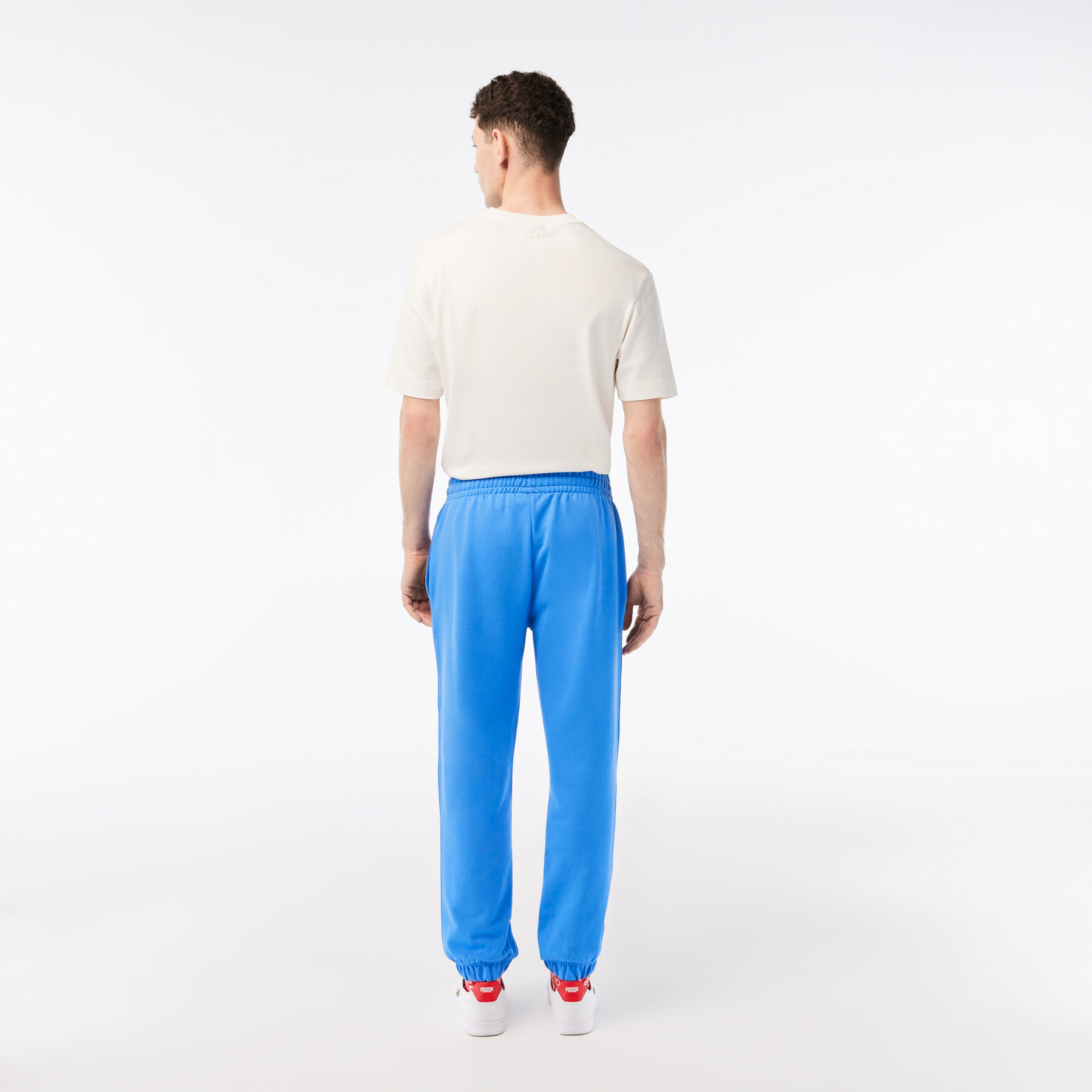 بنطال رياضي بطبعة تمساح للرجال مجموعة Lacoste x Netflix لاكوست بنطال رياضي بطبعة تمساح للرجال مجموعة lacoste x netflix