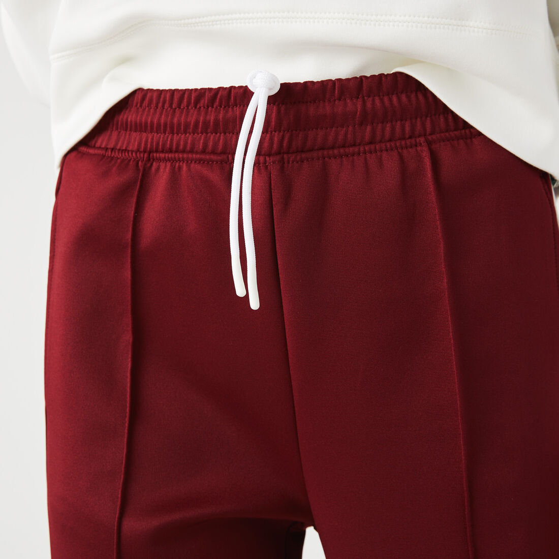 بنطال رياضي كلاسيكي بقصة فضفاضة وأشرطة جانبية للنساء بنطال رياضي كلاسيكي بقصة فضفاضة وأشرطة جانبية للنساء