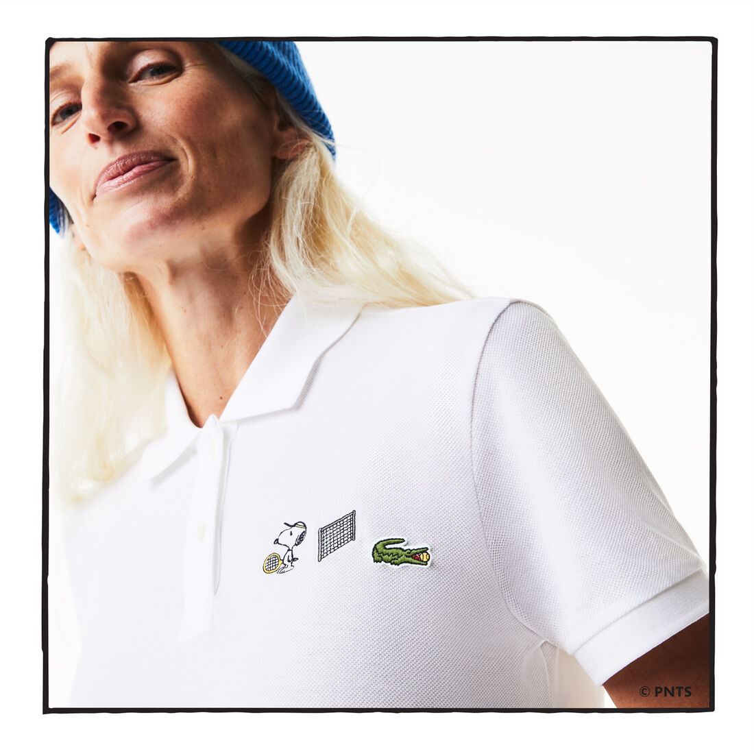 قميص بولو نسائي من القطن العضوي ذو قصة عادية من Lacoste x Peanuts قميص بولو نسائي من القطن العضوي ذو قصة عادية من Lacoste x Peanuts