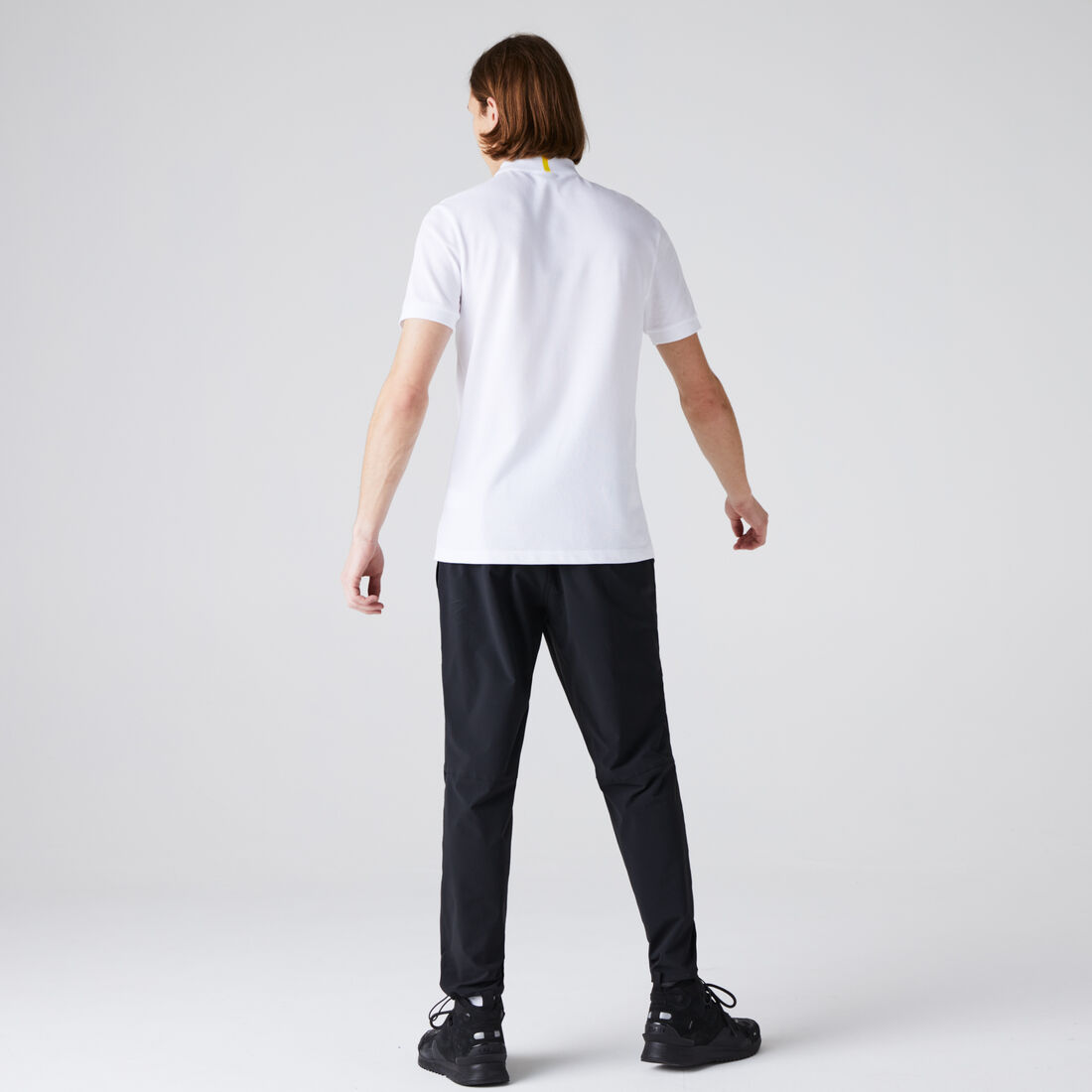 تيشيرت بولو قطن بيكيه عضوي للرجال مجموعة Lacoste x National Geographic تيشيرت بولو قطن بيكيه عضوي للرجال مجموعة Lacoste x National Geographic