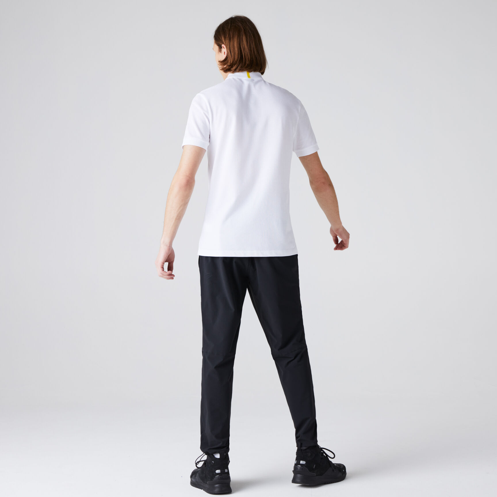 تيشيرت بولو قطن بيكيه عضوي للرجال مجموعة Lacoste x National Geographic تيشيرت بولو قطن بيكيه عضوي للرجال مجموعة Lacoste x National Geographic